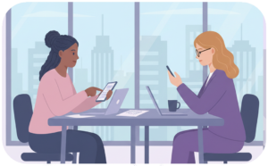 Two women testing mobile devices